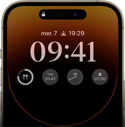 Vue avant de l’iPhone 14 Pro montrant l’écran toujours activé sur lequel figurent l’heure, la date, quatre widgets, et plus encore.
